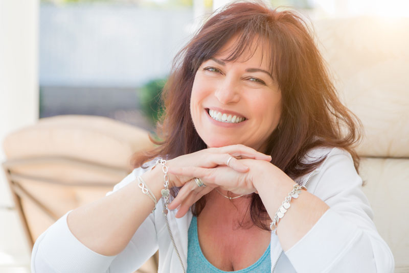 Dental Patient Smiling After A Dental Implant Procedure