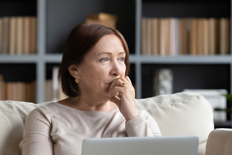 Dental Patient Wondering If She Should Get Dental Implants Or Dentures in Denver, NC