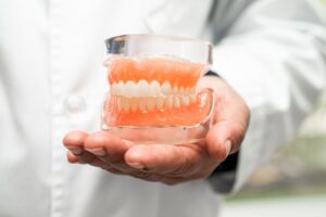 Dentist consulting with a patient about broken tooth treatment